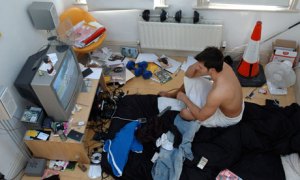 Man-watching-TV-in-his-me-002