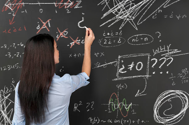 A chalkboard with the silly number written on it, along with many equations